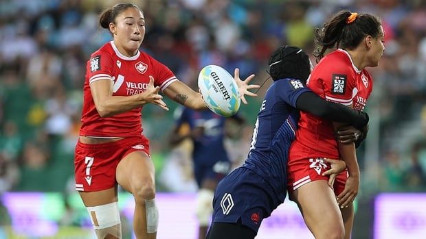 Canadian rugby sevens player Shoshanah Seumanutafa runs the ball down by Hada Traore of France during the third-place playoff match against France at HSBC Perth SVNS on January 26, 2025 in Perth, Australia. 