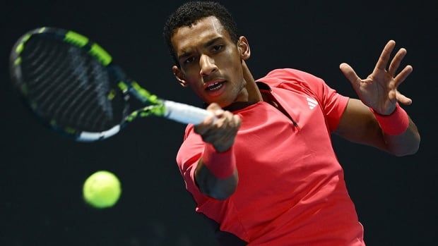 Canadian men's tennis player Felix Auger-Aliassime plays a forehand against Alejandro Davidovich Fokina of Spain in the second round of the Australian Open on January 15, 2025 in Melbourne. 