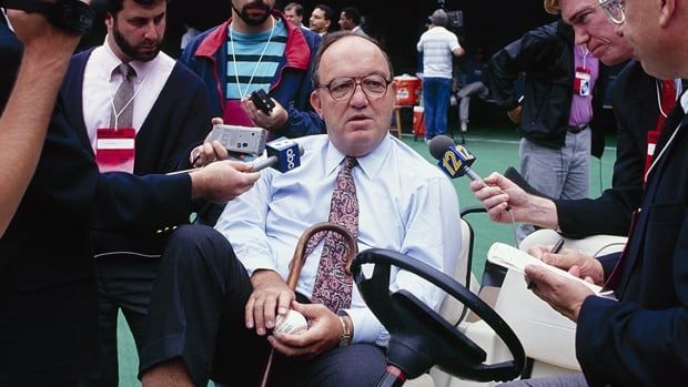 Major League Baseball commissioner Fay Vincent speaks to reporters before a game in the National League Championship Series between the Cincinnati Reds and hometown Pittsburgh Pirates at Three Rivers Stadium in October 1990 in Pennsylvania. 