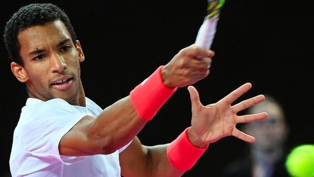 Canadian tennis player Felix Auger Aliassime returns the ball to American Aleksandar Kovacevic during their Occitanie men's final tennis match in Montpellier, France on February 2, 2025.   