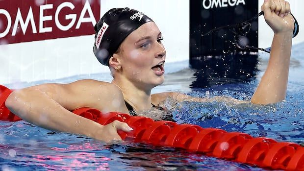 Summer McIntosh in the pool after winning a race.