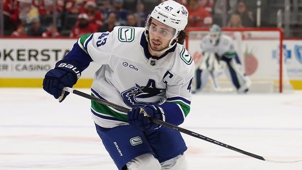 Vancouver Canucks defenceman Quinn Hughes plays against the hometown Detroit Red Wings at Little Caesars Arena on December 1, 2024 in Michigan.