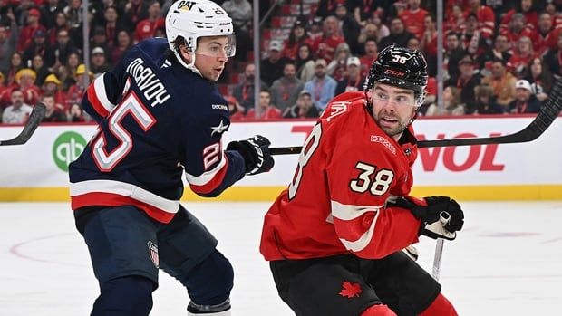 Team USA defenceman Charlie McAvoy checks Canada's Brandon Hagel during 4 Nations Face-Off action at the Bell Centre in Montreal, Quebec on February 15, 2025. 