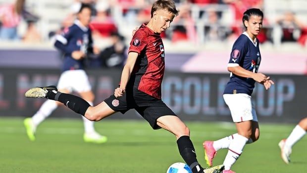 Canada soccer player Quinn looks to kick the ball during the first half against Paraguay at Shell Energy Stadium in women's soccer action on February 25, 2024 in Houston, Texas.