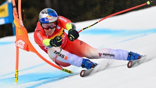 Alpine skier Marco Odermatt of Switzerland competes during a World Cup men's super-G event on February 23, 2025 in Crans Montana, Switzerland.