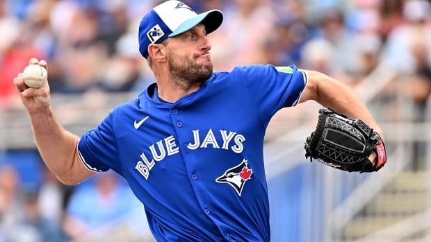 Toronto Blue Jays starting pitcher Max Scherzer throws against the visiting St. Louis Cardinals in the first inning of a spring training game at TD Ballpark in Dunedin, Florida on February 25, 2025.