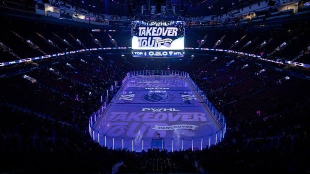 Fans gather to watch the Montreal Victoire and Toronto Sceptres warm up before a PWHL neutral site game in Vancouver on January 8, 2025.