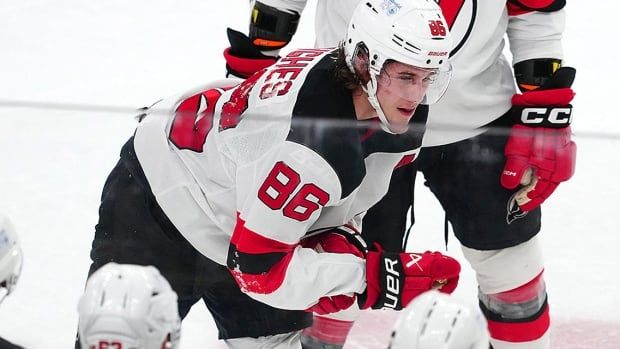 New Jersey Devils centre Jack Hughes makes his way off the ice after sustaining an apparent injury during a play against the hometown Vegas Golden Knights during the third period at T-Mobile Arena on March 2, 2025. 