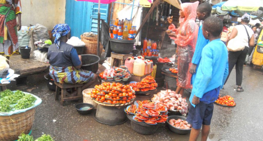 trading activities at mile ii market, lagos, yesterday