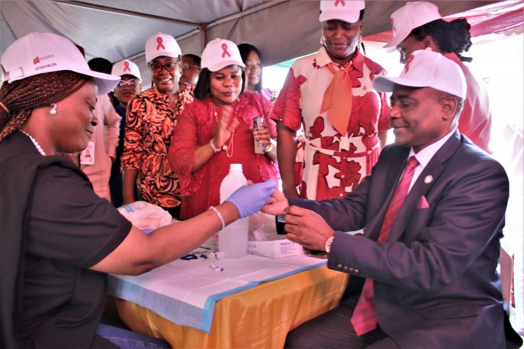 The Director-General of NACA, Temitope Ilori, Leo Zekeng, Country Director UNAIDS Nigeria; Partners and NACA management staff at the HIV testing site during the 2024 World AIDS Day Press Conference in Abuja on Monday