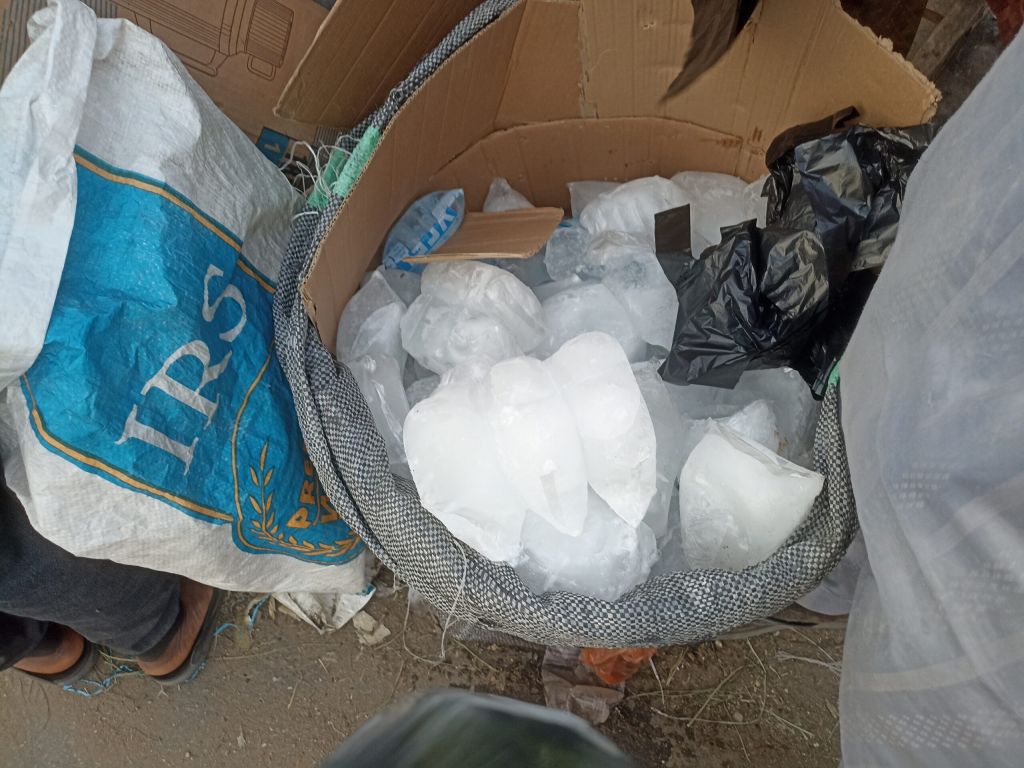 A vendor selling iced water