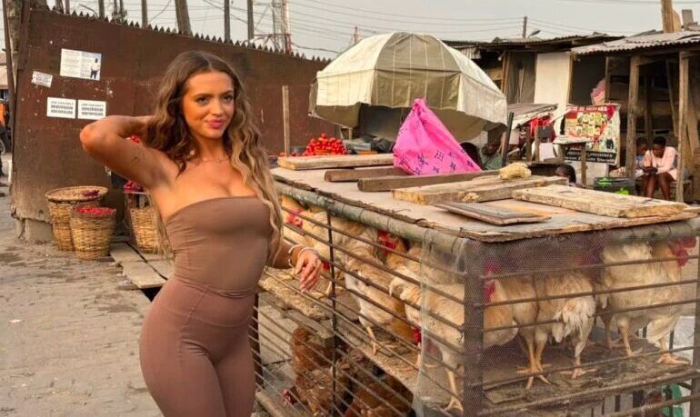 Famous American social media influencer Waoh Vicky pictured in a Lagos market